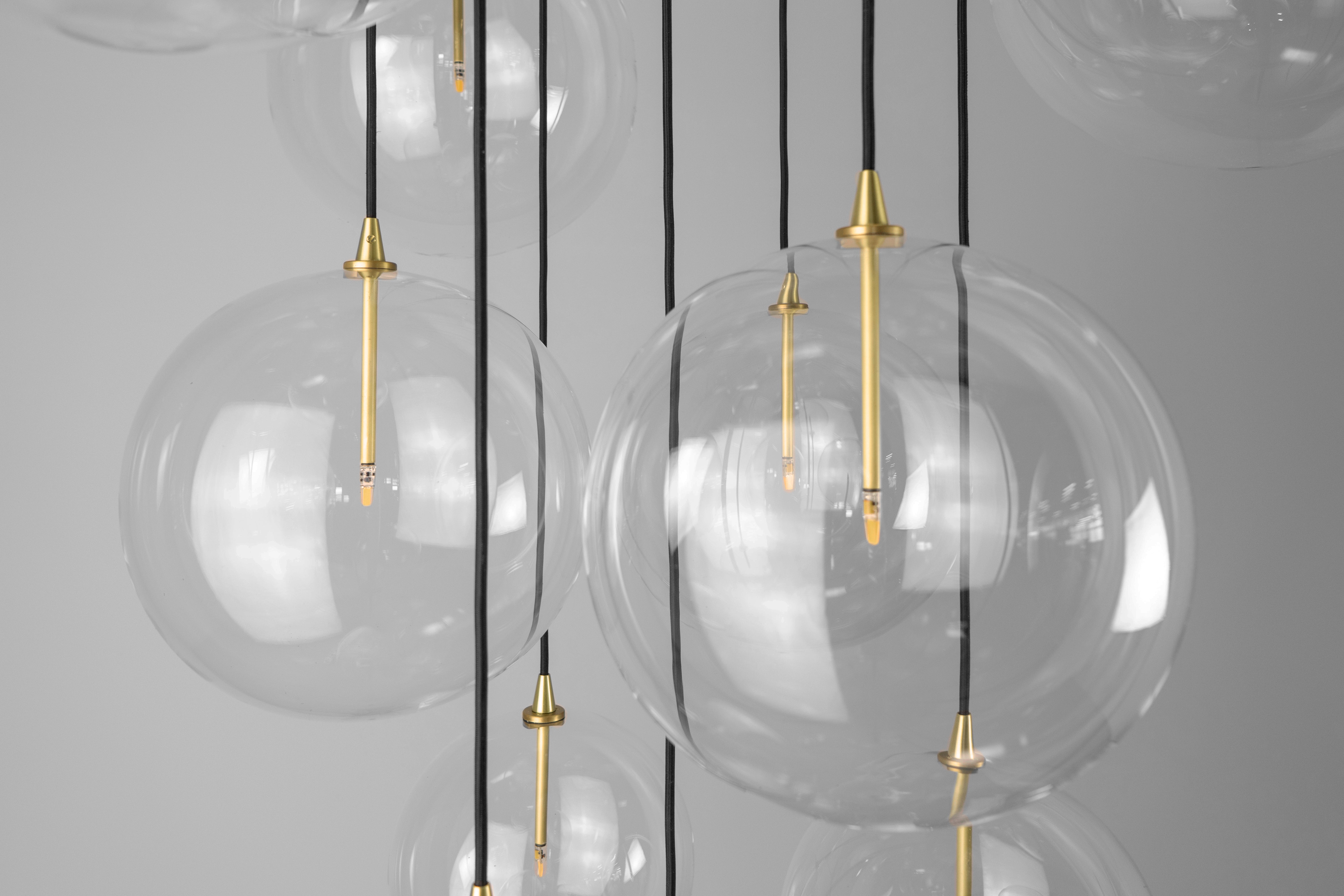 Schwung Cluster 13 Burnished Brass Transparent Globe Mix Chandelier